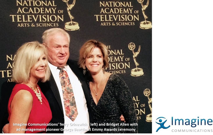 Imagine Communications' Terry Grinewich ( left) and Bridget Allen with ad management pioneer George Beattie at Emmy Awards ceremony